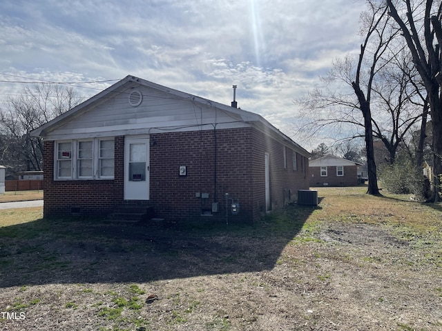 view of home's exterior with central AC unit