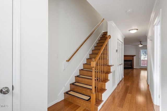 staircase featuring hardwood / wood-style floors