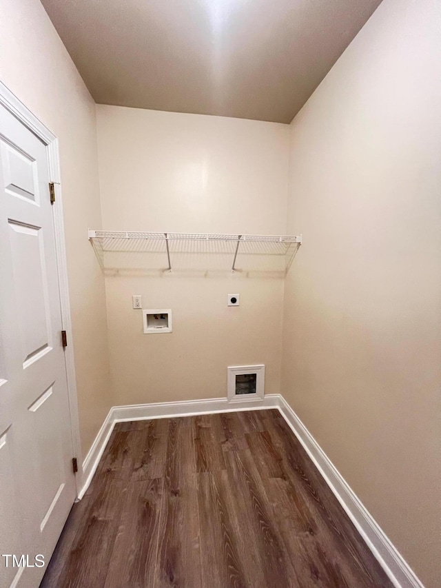 washroom featuring electric dryer hookup, dark wood-type flooring, and washer hookup