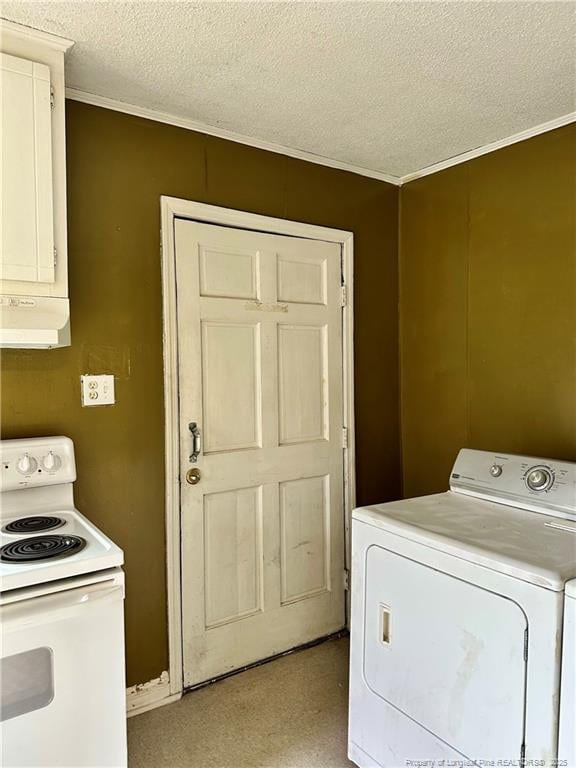 laundry room featuring washer / dryer and a textured ceiling