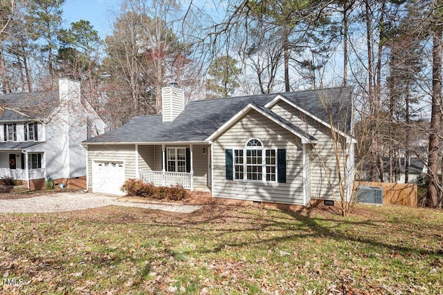 view of front of property featuring a porch, a front yard, a garage, crawl space, and driveway