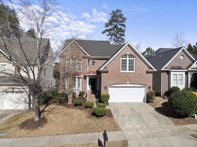 front of property with a garage