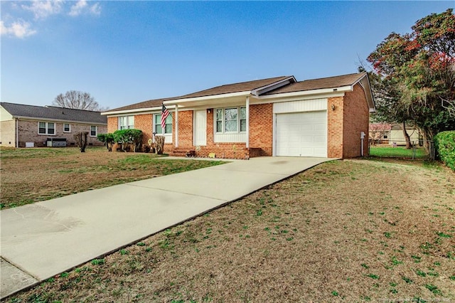 ranch-style house featuring a garage and a front yard