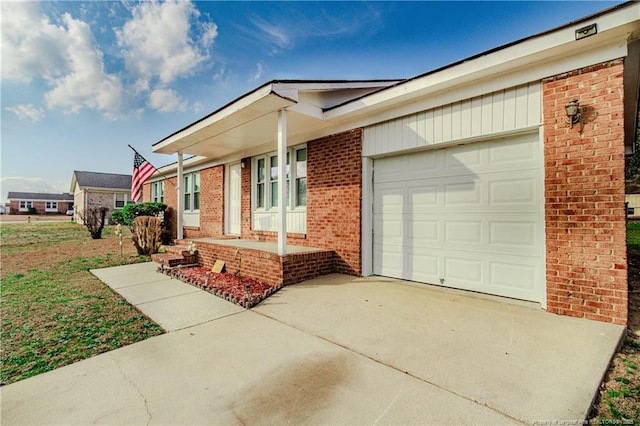 ranch-style home featuring a garage