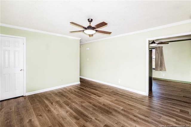 empty room with crown molding, ceiling fan, and dark wood-type flooring