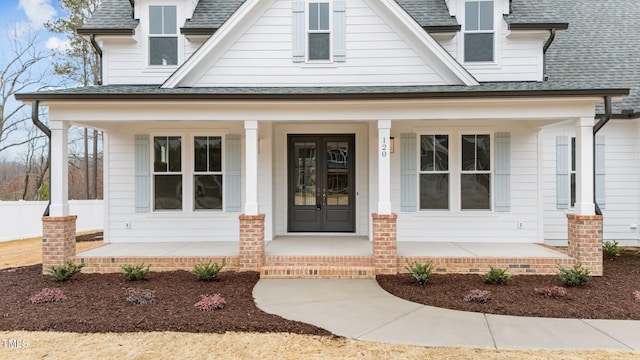 property entrance featuring a porch