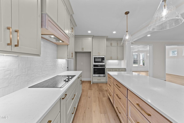 kitchen with built in microwave, decorative light fixtures, black electric cooktop, custom range hood, and oven