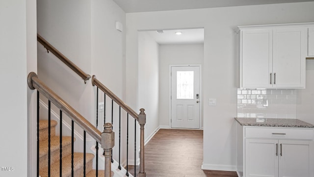 entryway featuring wood-type flooring