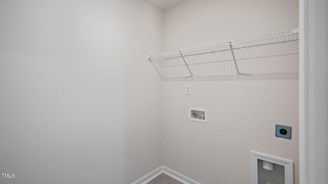 clothes washing area featuring electric dryer hookup and washer hookup