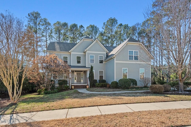 view of front of property with a front lawn