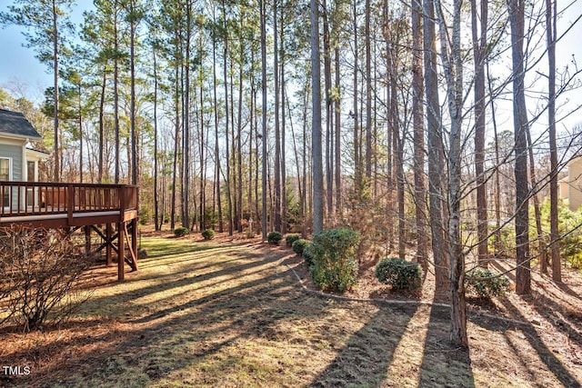 view of yard featuring a deck