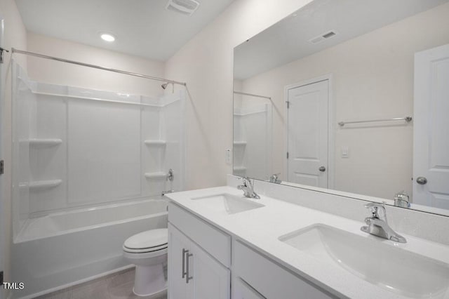 full bathroom featuring vanity, shower / bathing tub combination, and toilet