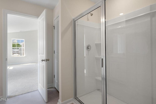 bathroom with an enclosed shower