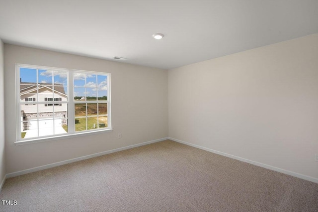 view of carpeted spare room