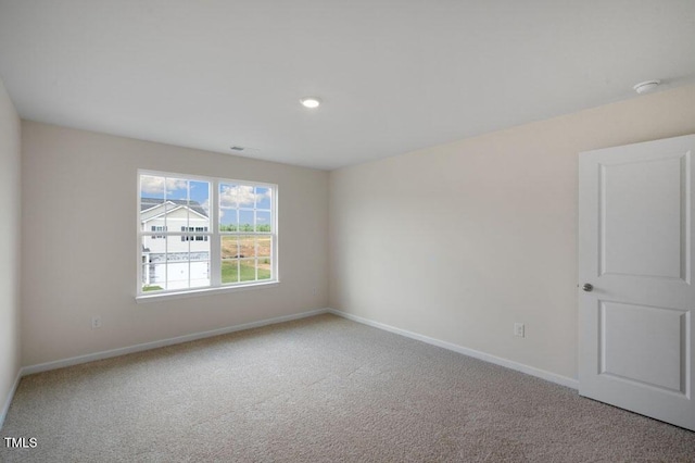 view of carpeted spare room