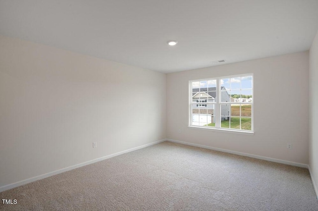 view of carpeted spare room