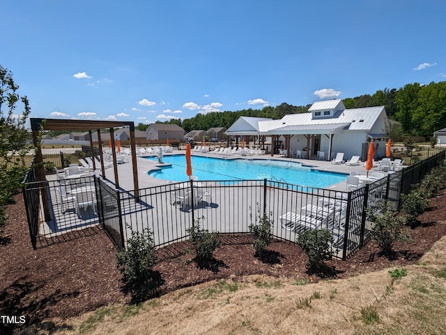 view of swimming pool featuring a patio area