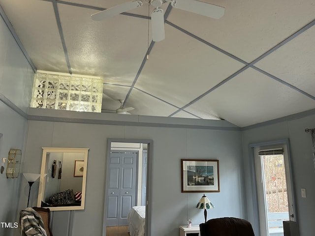 interior space featuring ceiling fan