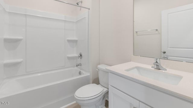 full bathroom featuring vanity, tub / shower combination, and toilet