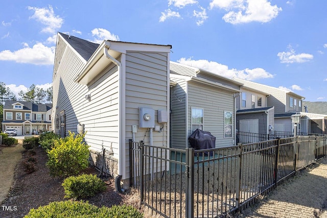 view of front of home with fence