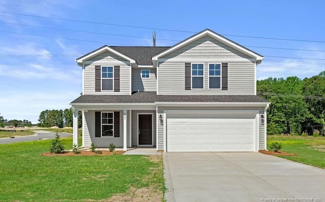 821 Tori Dr, Spring Lake, NC 28390 - view of front facade with a garage, driveway, a front yard, and a shingled roof