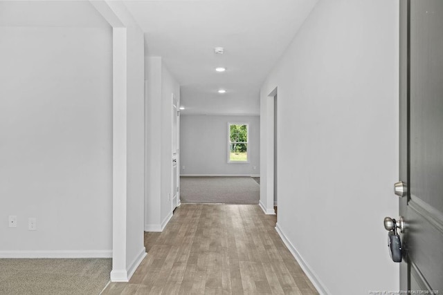 821 Tori Dr, Spring Lake, NC 28390 - hall featuring baseboards, recessed lighting, and light wood-style floors