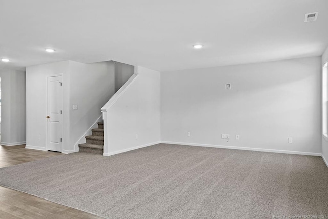 821 Tori Dr, Spring Lake, NC 28390 - unfurnished living room with stairway, recessed lighting, and baseboards