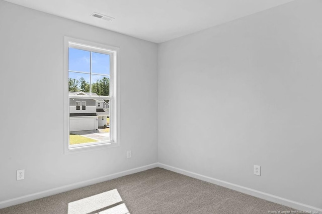 821 Tori Dr, Spring Lake, NC 28390 - carpeted empty room featuring baseboards