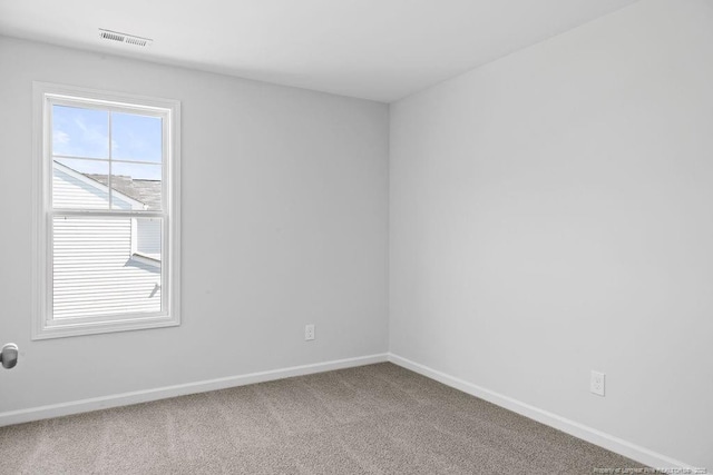 821 Tori Dr, Spring Lake, NC 28390 - unfurnished room featuring baseboards and carpet