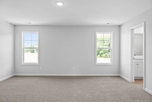 821 Tori Dr, Spring Lake, NC 28390 - carpeted spare room with baseboards