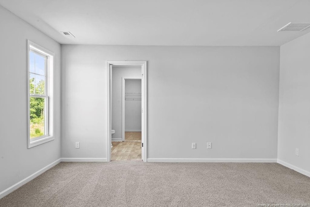 821 Tori Dr, Spring Lake, NC 28390 - empty room with carpet floors and baseboards