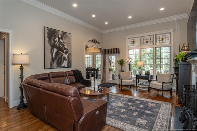 living room with crown molding and dark hardwood / wood-style floors