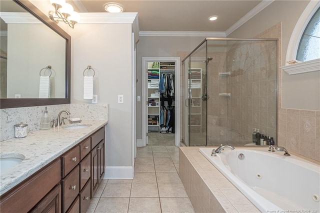 bathroom featuring tile patterned flooring, ornamental molding, vanity, and plus walk in shower