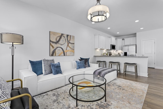 living room with hardwood / wood-style flooring