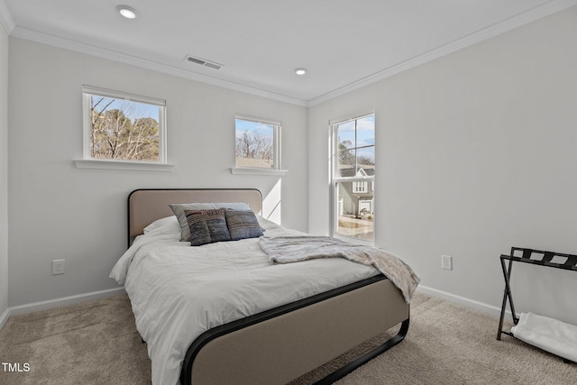 bedroom with light colored carpet and ornamental molding