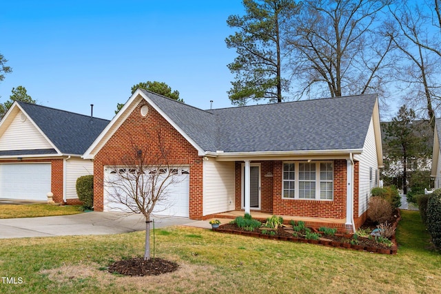 view of front facade with a front lawn, concrete driveway, brick siding, and an attached garage