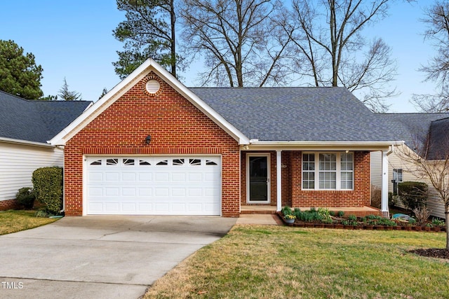 view of front facade featuring driveway, a garage, a shingled roof, brick siding, and a front yard