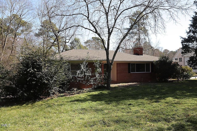 exterior space with a lawn