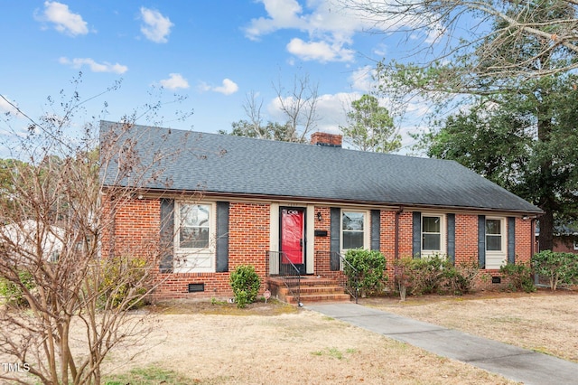 single story home with a front lawn