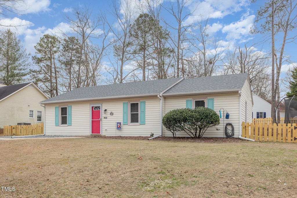 single story home with a front yard