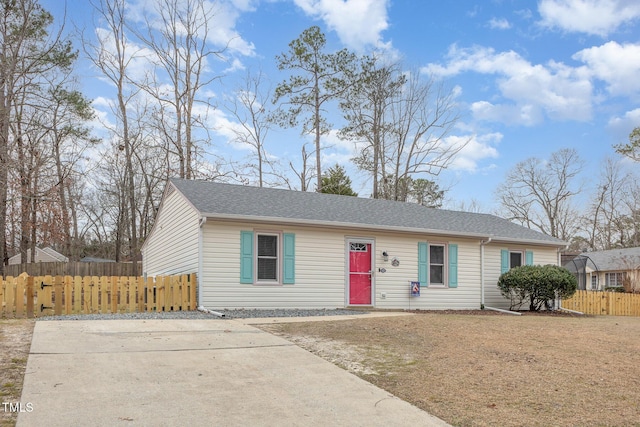 ranch-style house with a front lawn