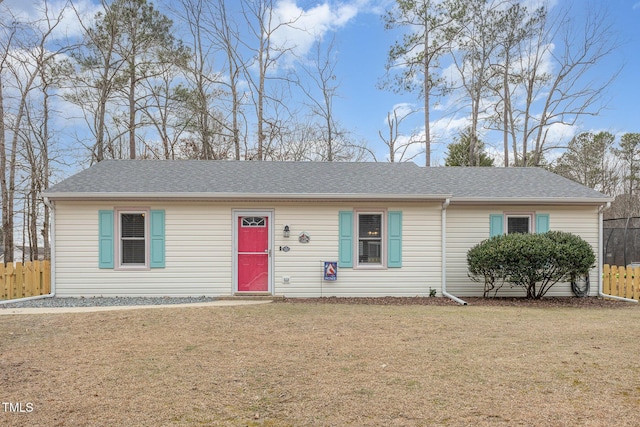 ranch-style home with a front yard