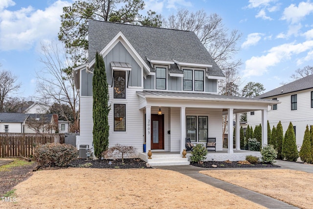 view of front of property featuring central AC and a porch