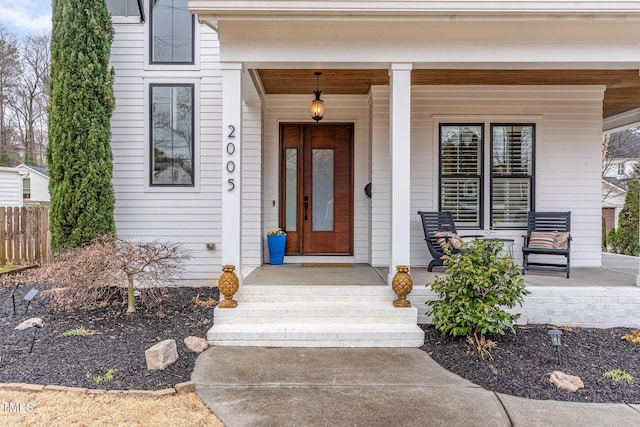 entrance to property with covered porch