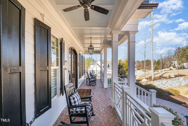 view of patio featuring covered porch and a ceiling fan