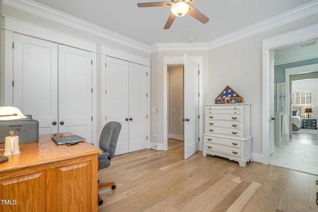 office area with ceiling fan, visible vents, baseboards, ornamental molding, and light wood finished floors