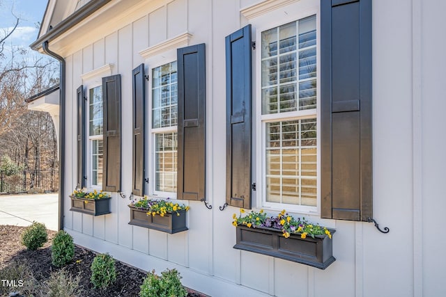 entrance to property featuring board and batten siding