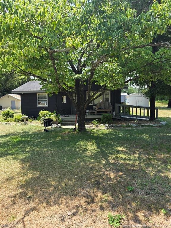 view of yard with a wooden deck