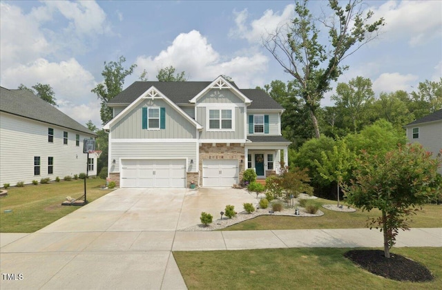 craftsman-style home featuring a garage and a front lawn