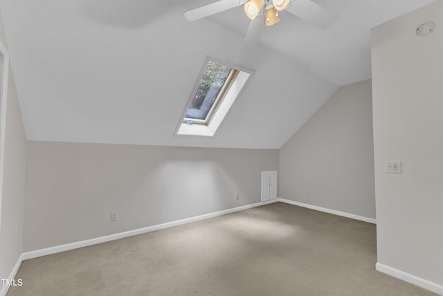 100 Windvale Ct, Cary, NC 27518 - additional living space featuring lofted ceiling, carpet, a skylight, and ceiling fan